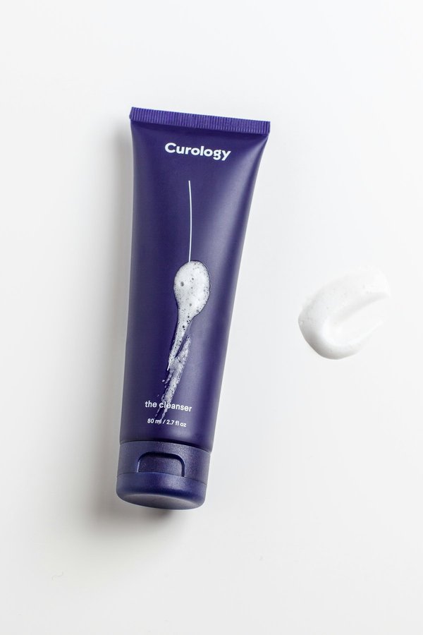 Skincare products arranged for a firming routine