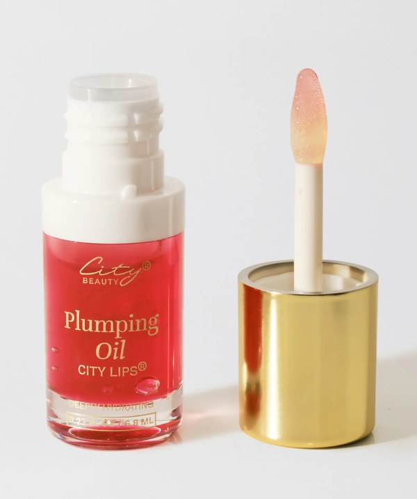 City Beauty City Lips Plumping Oil bottle with the applicator and gold cap