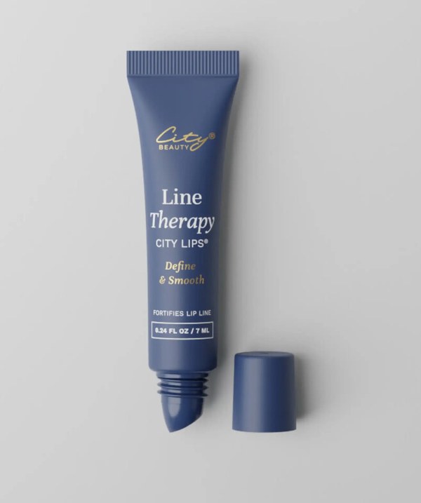 City Beauty Line Therapy tube with the cap off and a dab of product on the nozzle