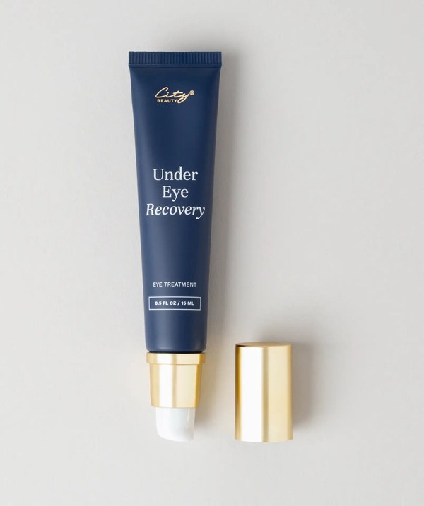 City Beauty Under Eye Recovery tube with the applicator tip showing and the gold cap beside it
