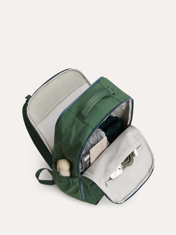 Open Bagsmart Moss 22L backpack in green showing the laptop compartment and organizer pockets
